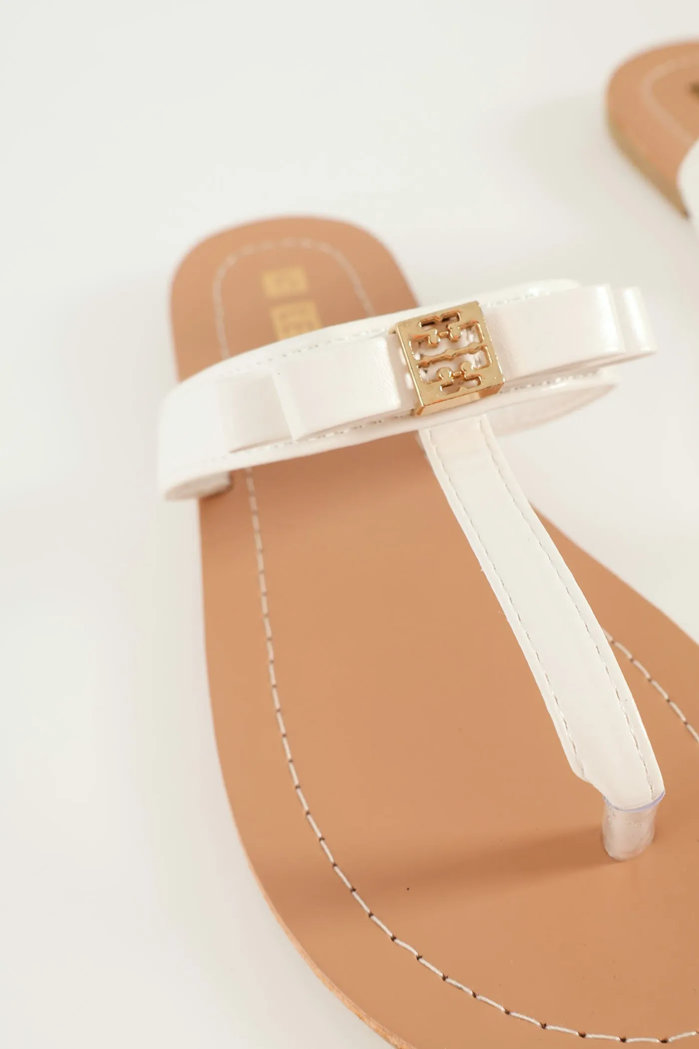 Flat Thong Bow Sandal With Gold Centre Trim - White