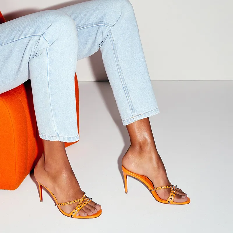 Sleek Orange Leather Sandal with Spikes